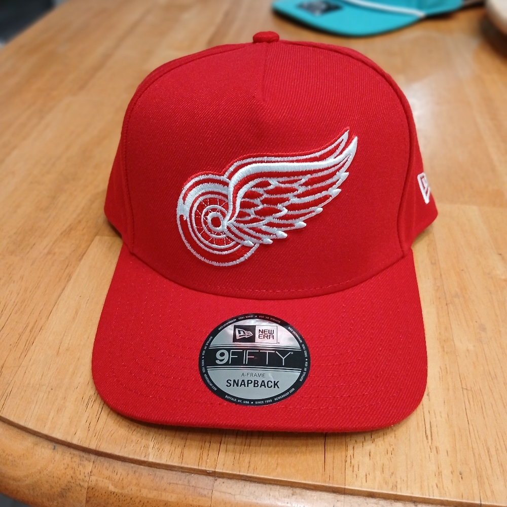New Era Red Snapback with Silver Wing Design
